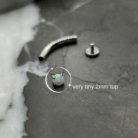 Tiny "Floating" Curved Barbell