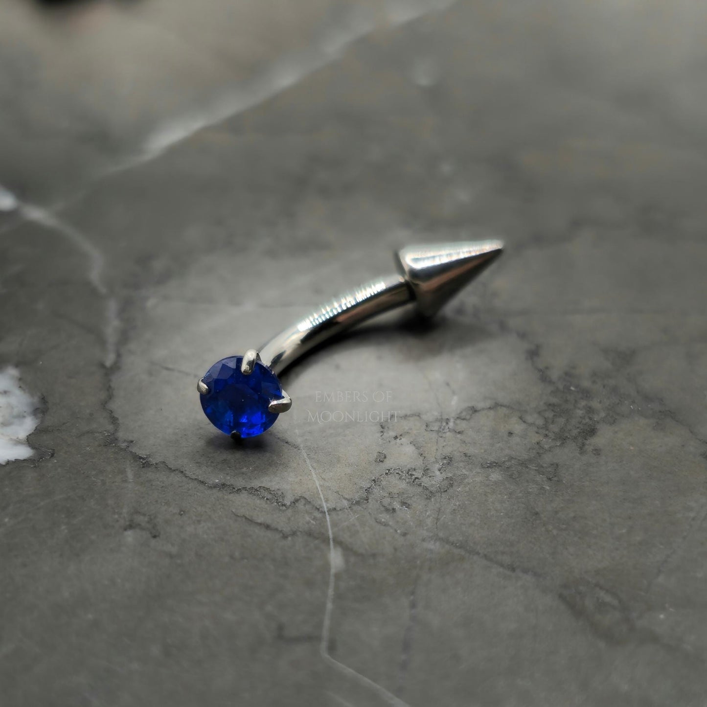 Blue Zirconia + Spike Curved Barbell