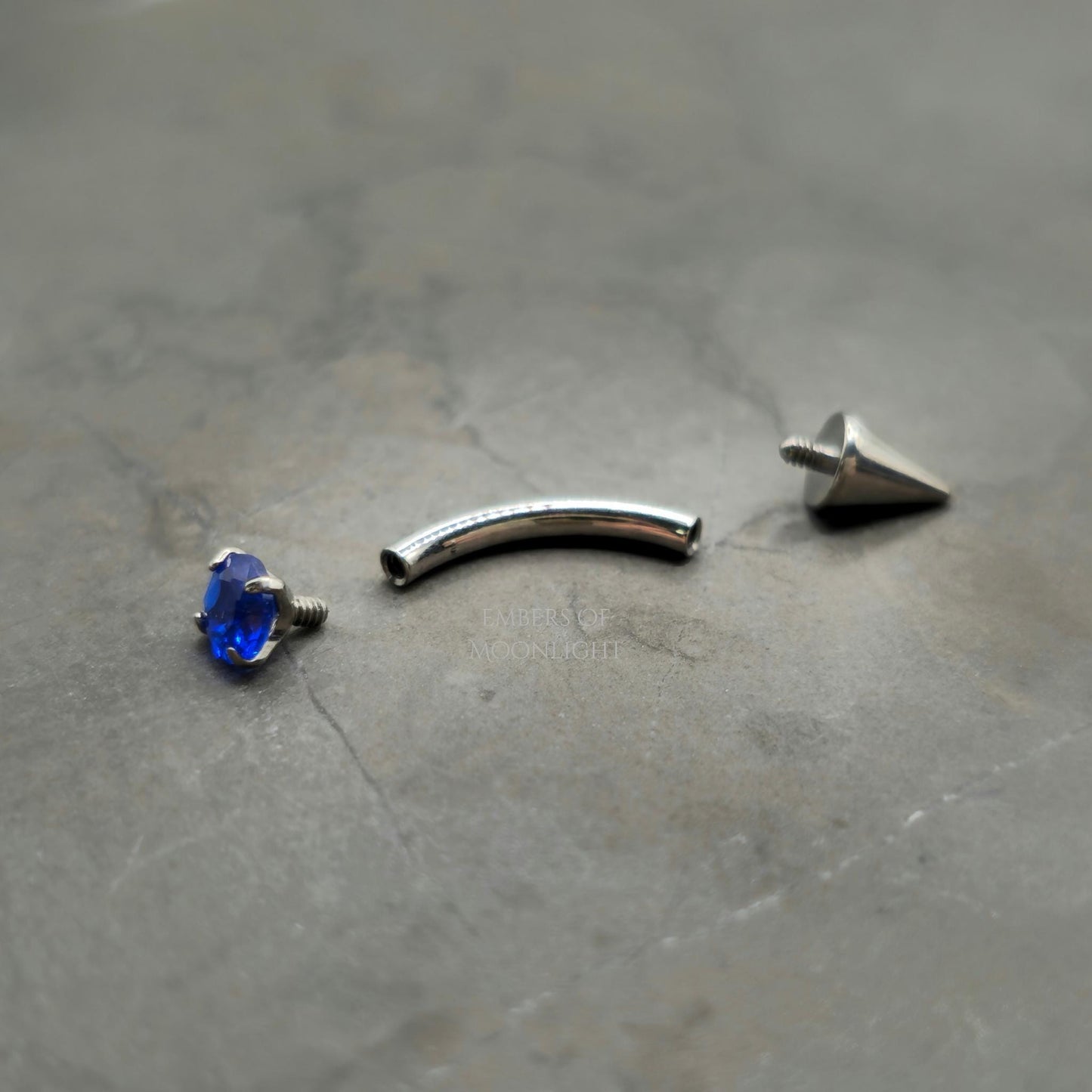 Blue Zirconia + Spike Curved Barbell